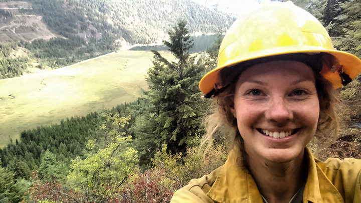 Melanie Louis, former cross-country runner and biology major, climbs to fight the Rail Fire in Oregon.