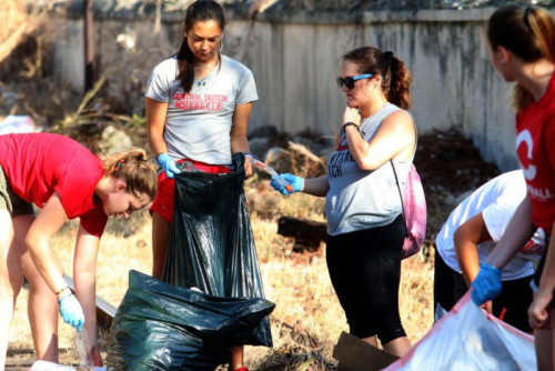 Central College students, led by student Elizabeth Sheldon, were up early in the morning to pick up litter.