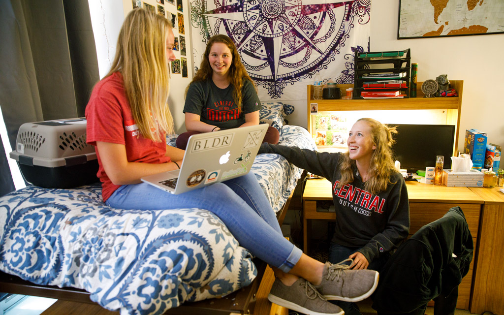 Students in their Graham Hall dorm room.