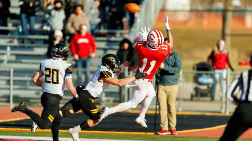 Erik Knaack makes a 34-yard TD grab with 15 seconds left to send Saturday's game to overtime.