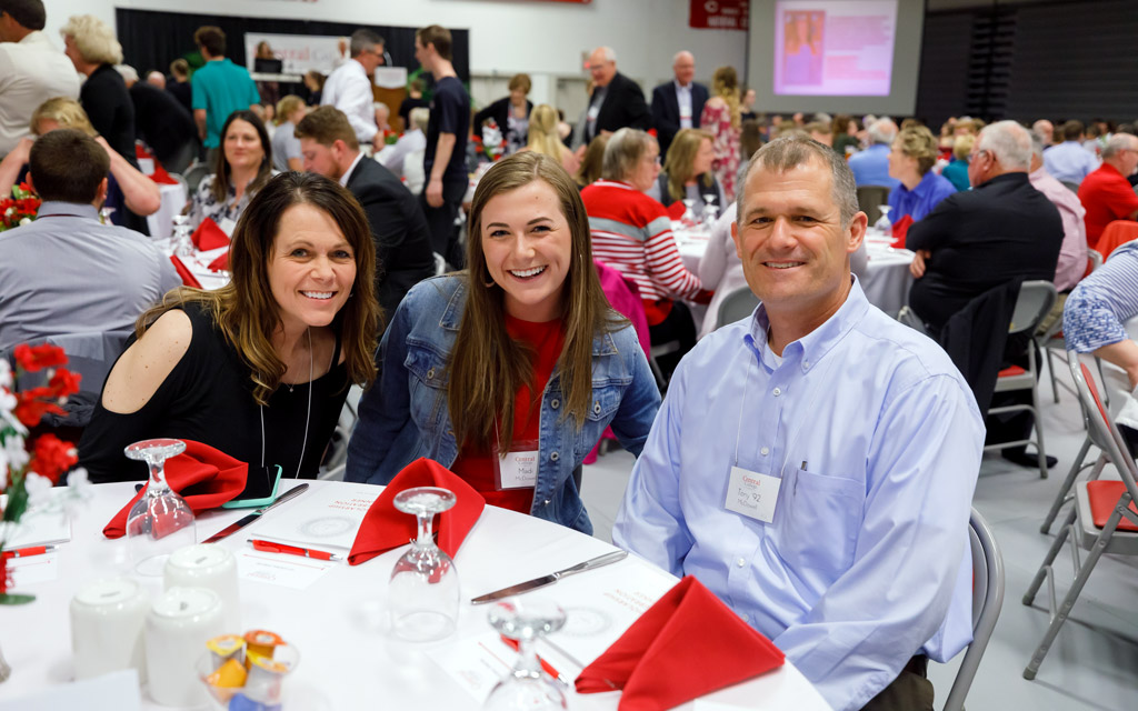 A student and donors at the annual Scholarship Dinner event.