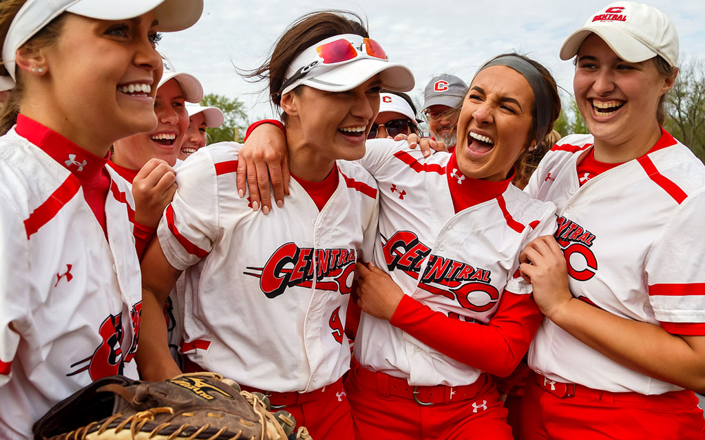 Amanda Sigulas, Daria Parchert, Paige Roehlk and Meredith Mahoney celebrate Central's 13th conference crown.