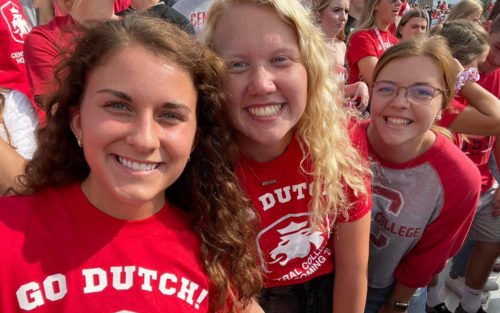 Hailey Swan ’23 and friends at a Central Dutch football game.
