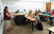 Wendy Weber instructing students in Central classroom.
