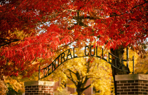 Central College sign with fall leaves