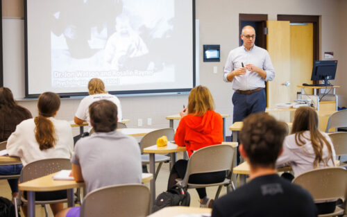 Prof. Shawn Wick in front of a class.