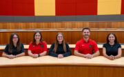 Six student senate leaders seated in a classroom